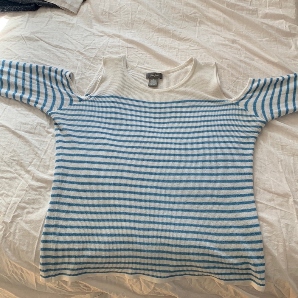 Three sweaters. Excellent condition. Purchase separate or together